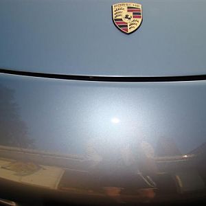 Porsche flash emblem.